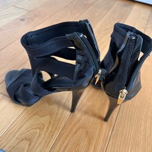 Calvin Klein size 6.5-7 black artillero heels